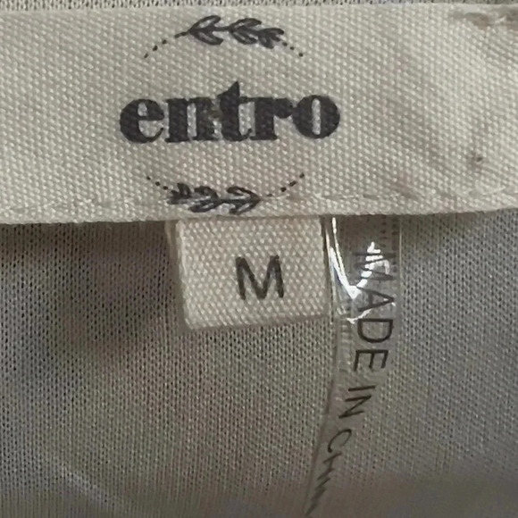 Entro dress size medium                    
Pit to Pit 19”
Length 
Pit to Hem 22 - Picture 3 of 4